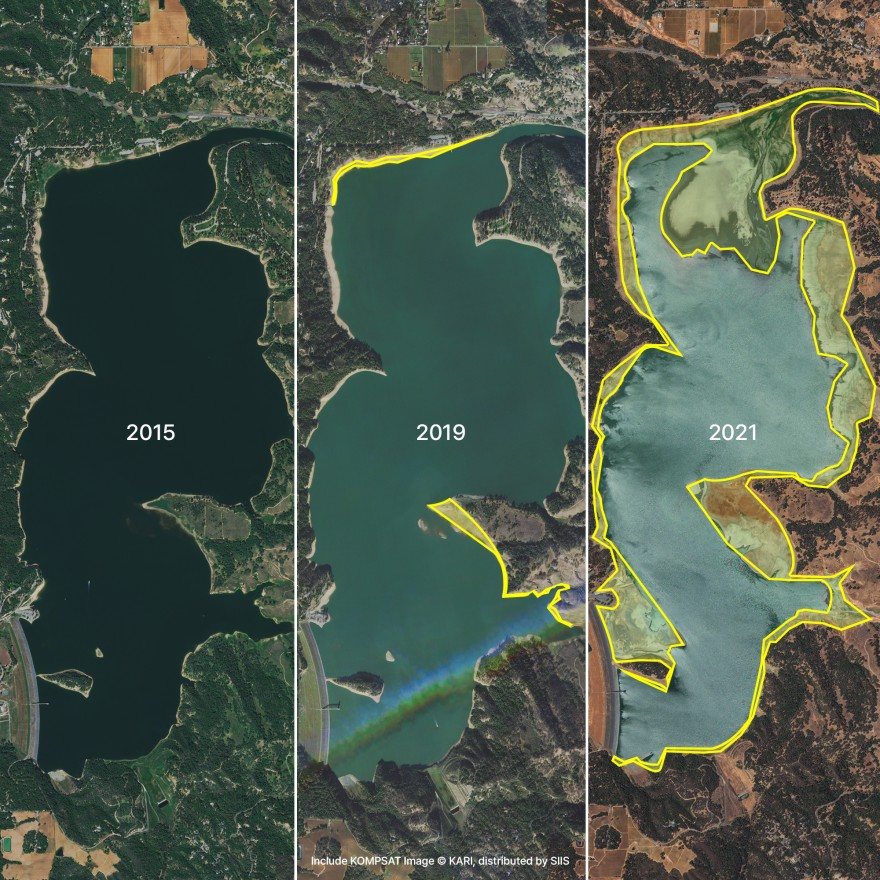 Three satellite images of the same reservoir labelled 2015, 2019 and 2021, with yellow outlines tracing the shoreline as the water shrinks