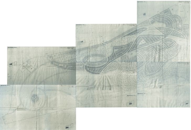 Sealed registry index map sheets stitched together, showing the scheme's planned parcels and curving roads